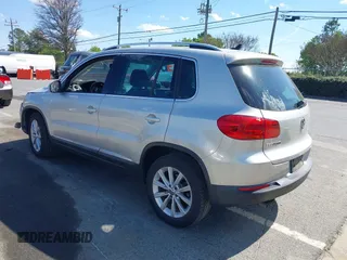 2015 Volkswagen Tiguan SE with VIN WVGAV7AX0FW544218, listed as a IAAI auction lot 41897418 with 97,235 mi miles and . Bid and sale history available at DreamBid. Image 3.