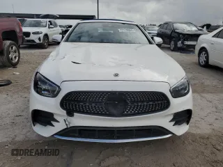 2021 Mercedes-Benz E 450 with VIN W1K1K5JB8MF157053, listed as a Copart auction lot 77119904 with 14,081 mi miles and Salvage title. Bid and sale history available at DreamBid. Image 5.
