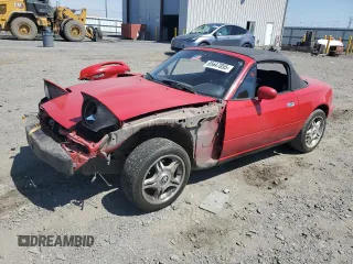 1995 Mazda MX-5 Miata with VIN JM1NA3534S0619078, listed as a Copart auction lot 65647055 with 56,670 mi miles and Salvage title. Bid and sale history available at DreamBid. Image 1.