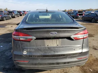 2020 Ford Fusion Plug-In Hybrid Titanium with VIN 3FA6P0SU5LR230939, listed as a Copart auction lot 77899134 with 104,656 mi miles and Salvage Title. Bid and sale history available at carsss.com. Image 6.