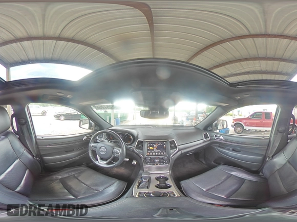 2018 Jeep Grand Cherokee High Altitude with VIN 1C4RJFCT8JC344110, listed as a Copart auction lot 60257065 with 94,917 mi miles and Salvage title. Bid and sale history available at DreamBid. Image 14.