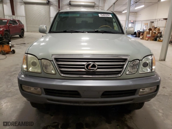 2004 Lexus LX 470 with VIN JTJHT00W843548361, listed as a Copart auction lot 76465204 with 257,543 mi miles and Salvage Title. Bid and sale history available at carsss.com. Image 5.