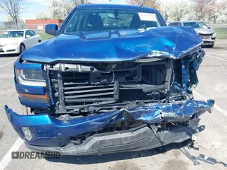 2017 Chevrolet Silverado 1500 LT with VIN 1GCVKREC6HZ312970, listed as a IAAI auction lot 41978950 with 104,239 mi miles and . Bid and sale history available at DreamBid. Image 13.