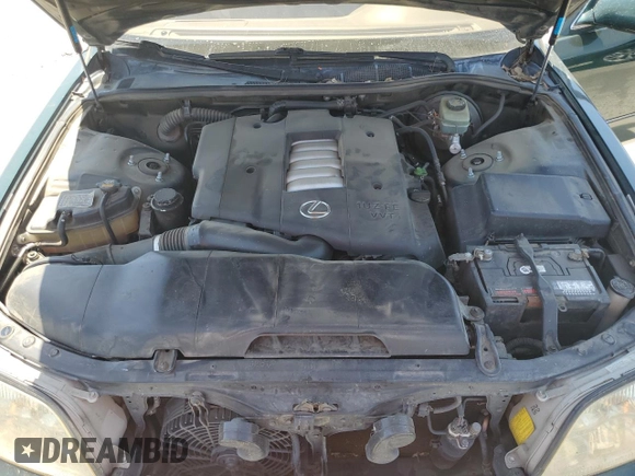 1999 Lexus LS 400 z VIN JT8BH28F5X0144481, wystawiony jako Copart lot #58867255 z przebiegiem 183 002 mil mil oraz Szkoda całkowita • Salvage title. Historia ofert i sprzedaży dostępna na DreamBid. Obrazek 11.