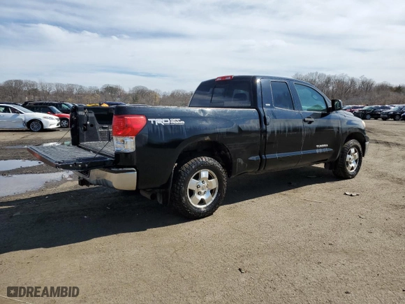 2012 Toyota Tundra 4WD Truck with VIN 5TFUM5F14CX028897, listed as a Copart auction lot 49677295 with 206,599 mi miles and Salvage Title. Bid and sale history available at carsss.com. Image 3.