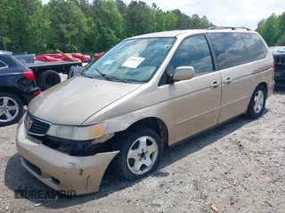 2000 Honda Odyssey EX with VIN 2HKRL1868YH513587, listed as a IAAI auction lot 42092115 with 302,555 mi miles and . Bid and sale history available at DreamBid. Image 2.