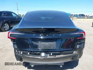 2025 Tesla Model 3 Long Range with VIN 5YJ3E1EA5SF919681, listed as a IAAI auction lot 41818042 with 2,173 mi miles and . Bid and sale history available at DreamBid. Image 17.