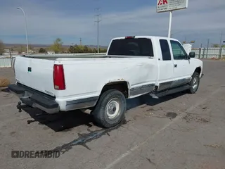 1994 GMC Sierra 2500 z VIN 1GTGC29K6RE565925, wystawiony jako IAAI lot #41798399 z przebiegiem 281 151 mil mil oraz . Historia ofert i sprzedaży dostępna na DreamBid. Obrazek 4.