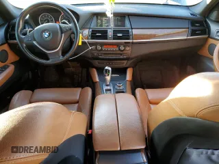 2013 BMW X6 xDrive35i z VIN 5UXFG2C5XDL786031, wystawiony jako Copart lot #42719395 z przebiegiem 95 920 mil mil oraz Szkoda całkowita • Salvage title. Historia ofert i sprzedaży dostępna na DreamBid. Obrazek 8.