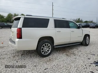 2015 Chevrolet Suburban LTZ with VIN 1GNSCKKC2FR177759, listed as a Copart auction lot 50919105 with 87,793 mi miles and Salvage Title. Bid and sale history available at DreamBid. Image 3.