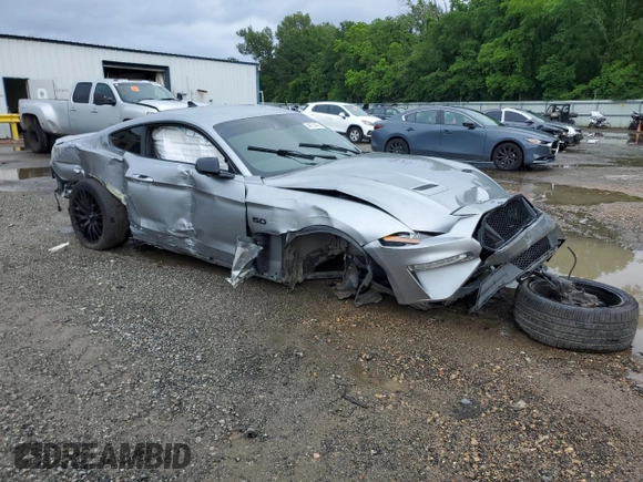 2021 Ford Mustang GT with VIN 1FA6P8CF4M5116482, listed as a Copart auction lot 54731445 with 134,900 mi miles and Salvage title. Bid and sale history available at DreamBid. Image 4.