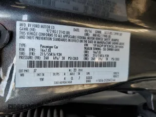 2016 Ford Focus SE with VIN 1FADP3FE8GL381855, listed as a Copart auction lot 57366645 with 104,709 mi miles and Salvage title. Bid and sale history available at DreamBid. Image 12.