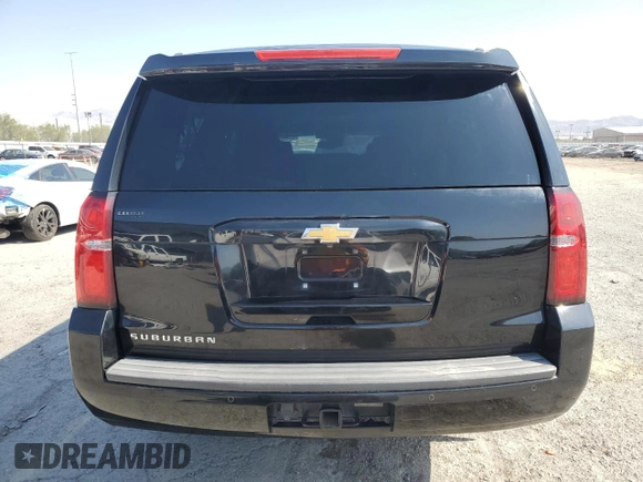2015 Chevrolet Suburban LT with VIN 1GNSCJKC9FR732720, listed as a Copart auction lot 62564765 with 99,194 mi miles and Salvage title. Bid and sale history available at DreamBid. Image 6.