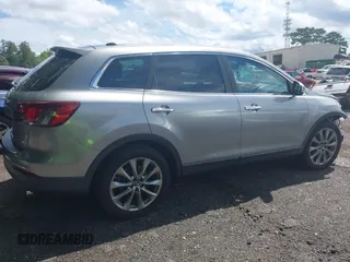 2014 Mazda CX-9 Grand Touring с VIN JM3TB2DA3E0443604, выставлен на аукционе IAAI как лот 42456552 с пробегом 150 053 миль миль и . История ставок и продаж доступна на DreamBid. Изображение 13.