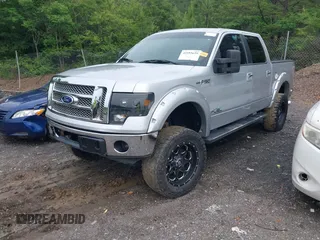 2011 Ford F-150 XLT with VIN 1FTFW1ET7BFA93794, listed as a IAAI auction lot 42185659 with 184,186 mi miles and . Bid and sale history available at carsss.com. Image 2.