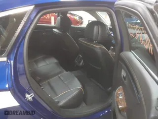 2014 Chevrolet Impala LTZ with VIN 1G1155S32EU100295, listed as a IAAI auction lot 41684026 with 161,175 mi miles. Bid and sale history available at carsss.com. Image 8.