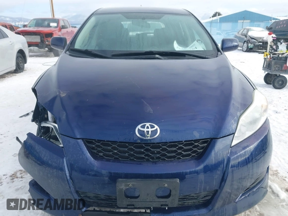 2009 Toyota Matrix with VIN 2T1KU40E69C045320, listed as a IAAI auction lot 41481764 with 162,766 mi miles. Bid and sale history available at carsss.com. Image 13.