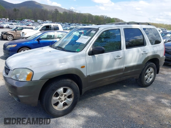 2001 Mazda Tribute LX with VIN 4F2YU09131KM12857, listed as a IAAI auction lot 42034605 with 257,015 mi miles and . Bid and sale history available at carsss.com. Image 6.