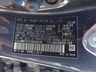 2019 Honda Civic Sedan EX with VIN JHMFC1F31KX005256, listed as a IAAI auction lot 41765551 with 80,897 mi miles. Bid and sale history available at carsss.com. Image 9.