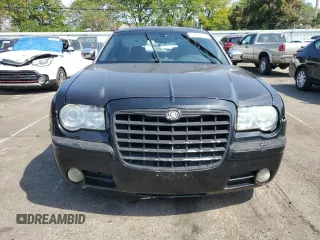 2005 Chrysler 300 with VIN 2C3JA63HX5H132776, listed as a Copart auction lot 69312144 with 136,492 mi miles and Salvage Title. Bid and sale history available at carsss.com. Image 5.