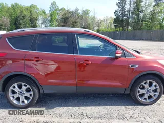 2016 Ford Escape Titanium with VIN 1FMCU9JX9GUA16892, listed as a IAAI auction lot 42110986 with 87,775 mi miles and . Bid and sale history available at DreamBid. Image 13.