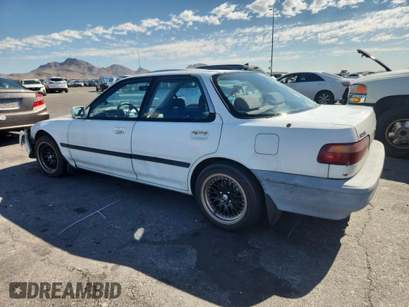 1992 Acura Integra with VIN JH4DB1649NS000455, listed as a Copart auction lot 62386755 with 209,785 mi miles and Salvage title. Bid and sale history available at DreamBid. Image 2.