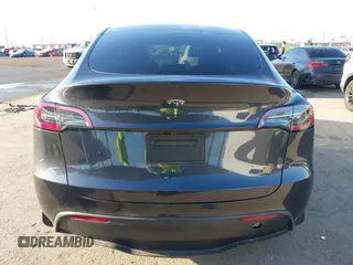 2024 Tesla Model Y with VIN 7SAYGDED5RF103983, listed as a IAAI auction lot 41933836 with 11,398 mi miles and . Bid and sale history available at DreamBid. Image 16.