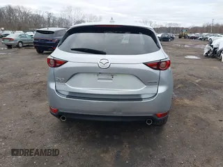 2020 Mazda CX-5 Grand Touring with VIN JM3KFBDM4L0843825, listed as a IAAI auction lot 41733575 with 18,800 mi miles. Bid and sale history available at carsss.com. Image 17.