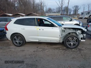 2021 Volvo XC60 Momentum z VIN YV4102DK3M1700720, wystawiony jako IAAI lot #41087871 z przebiegiem 39 385 mil mil oraz . Historia ofert i sprzedaży dostępna na DreamBid. Obrazek 14.