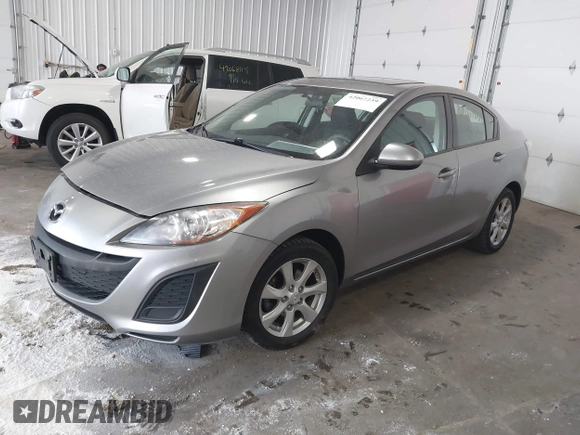 2011 Mazda Mazda3 i Touring with VIN JM1BL1VFXB1900999, listed as a IAAI auction lot 42067239 with 202,829 mi miles. Bid and sale history available at carsss.com. Image 17.