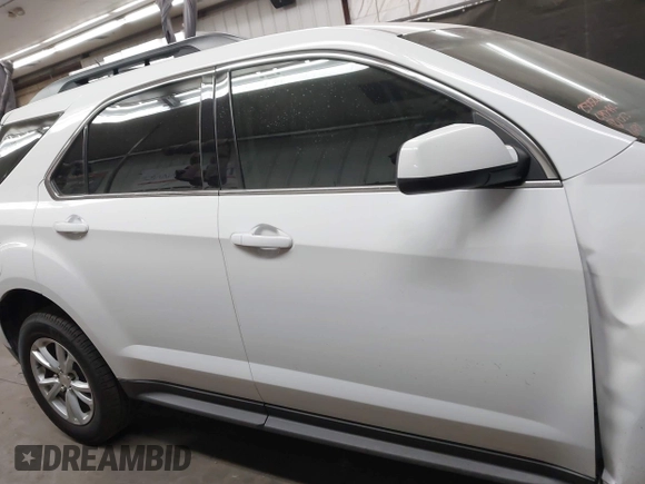 2017 Chevrolet Equinox LT with VIN 2GNFLFE32H6266931, listed as a IAAI auction lot 42036390 with 71,402 mi miles and . Bid and sale history available at carsss.com. Image 13.