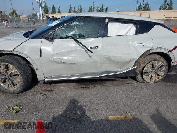 2024 Kia EV6 Wind with VIN KNDC34LA1R5214852, listed as a IAAI auction lot 41818262 with 14,950 mi miles and . Bid and sale history available at DreamBid. Image 6.