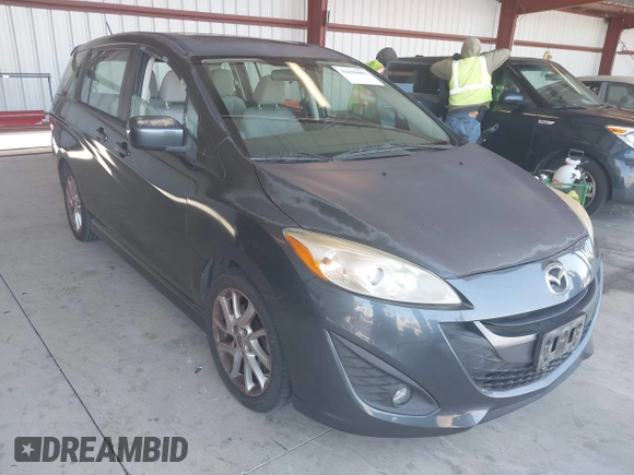2012 Mazda 5 Touring with VIN JM1CW2CLXC0111947, listed as a IAAI auction lot 42690065 with 116,308 mi miles and . Bid and sale history available at DreamBid. Image 1.