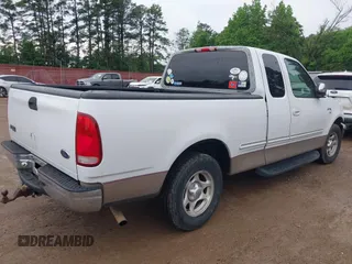 1998 Ford F-150 z VIN 1FTZX176XWNA40696, wystawiony jako IAAI lot #42064621 z przebiegiem 93 452 mil mil oraz . Historia ofert i sprzedaży dostępna na DreamBid. Obrazek 4.
