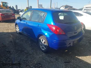 2012 Nissan Versa S with VIN 3N1BC1CPXCK808824, listed as a IAAI auction lot 42111187 with 196,196 mi miles. Bid and sale history available at carsss.com. Image 3.