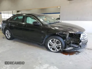 2014 Ford Taurus SEL z VIN 1FAHP2E84EG112877, wystawiony jako Copart lot #52612065 z przebiegiem 103 306 mil mil oraz Szkoda całkowita • Salvage title. Historia ofert i sprzedaży dostępna na DreamBid. Obrazek 4.