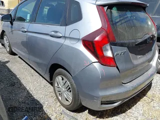 2019 Honda Fit LX z VIN 3HGGK5H42KM733455, wystawiony jako IAAI lot #42644157 z przebiegiem 51 036 mil mil oraz . Historia ofert i sprzedaży dostępna na DreamBid. Obrazek 3.