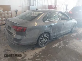 2016 Volkswagen Jetta Sport z VIN 3VWD17AJ9GM250243, wystawiony jako IAAI lot #41618054 z przebiegiem 38 520 mil mil oraz . Historia ofert i sprzedaży dostępna na DreamBid. Obrazek 4.