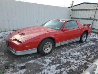 1987 Pontiac Firebird z VIN 1G2FW21H4HN251566, wystawiony jako Copart lot #88646205 z przebiegiem 103 803 mil mil oraz Szkoda całkowita • Salvage title. Historia ofert i sprzedaży dostępna na DreamBid. Obrazek 1.