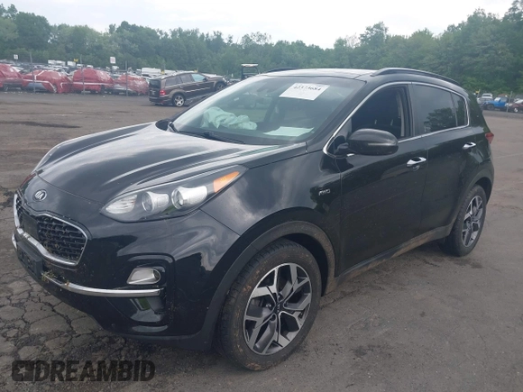2021 Kia Sportage EX with VIN KNDPNCAC5M7848673, listed as a IAAI auction lot 42373684 with 108,409 mi miles and . Bid and sale history available at DreamBid. Image 17.