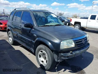 2001 Suzuki Grand Vitara JLX with VIN JS3TD62V414156342, listed as a IAAI auction lot 41762508 with 214,235 mi miles. Bid and sale history available at carsss.com. Image 1.