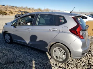 2018 Honda Fit LX with VIN 3HGGK5G46JM703892, listed as a Copart auction lot 79742984 with 67,825 mi miles and Salvage Title. Bid and sale history available at DreamBid. Image 2.