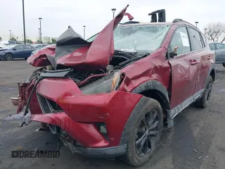 2018 Toyota RAV4 XLE with VIN 2T3RFREVXJW699293, listed as a IAAI auction lot 41881742 with Not Provided miles and . Bid and sale history available at DreamBid. Image 2.