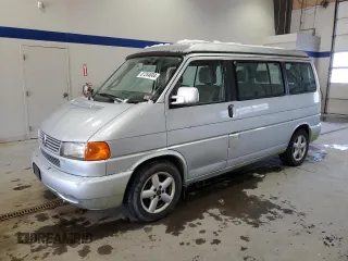2003 Volkswagen EuroVan MV with VIN WV2NB47073H001005, listed as a Copart auction lot 87284844 with 283,979 mi miles and Clean Title. Bid and sale history available at DreamBid. Image 1.