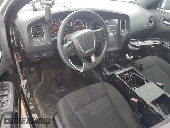 2019 Dodge Charger Police with VIN 2C3CDXATXKH627424, listed as a Copart auction lot 61445815 with 122,296 mi miles and Salvage title. Bid and sale history available at DreamBid. Image 8.