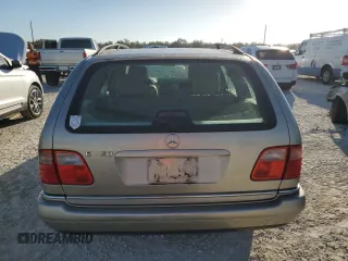 1998 Mercedes-Benz E-Class with VIN WDBJH65F9WA597132, listed as a Copart auction lot 77780094 with 0 mi miles and Salvage Title. Bid and sale history available at carsss.com. Image 6.