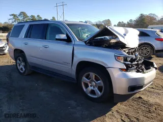 2016 Chevrolet Tahoe LS with VIN 1GNSCAKC1GR478325, listed as a Copart auction lot 43450305 with 179,700 mi miles and Salvage Title. Bid and sale history available at carsss.com. Image 4.