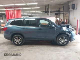2016 Honda Pilot EX-L z VIN 5FNYF5H64GB043257, wystawiony jako IAAI lot #42257997 z przebiegiem 203 606 mil mil oraz . Historia ofert i sprzedaży dostępna na DreamBid. Obrazek 13.