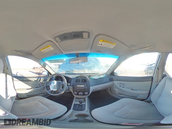 2008 Kia Spectra EX with VIN KNAFE121685507522, listed as a Copart auction lot 57908235 with 143,894 mi miles and Salvage title. Bid and sale history available at DreamBid. Image 14.