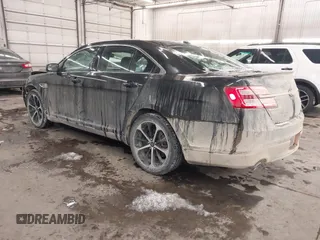 2014 Ford Taurus SEL with VIN 1FAHP2E87EG117653, listed as a IAAI auction lot 41589415 with 125,040 mi miles. Bid and sale history available at carsss.com. Image 3.